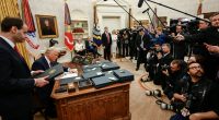 Donald Trump signing executive orders as 47th President of the United States